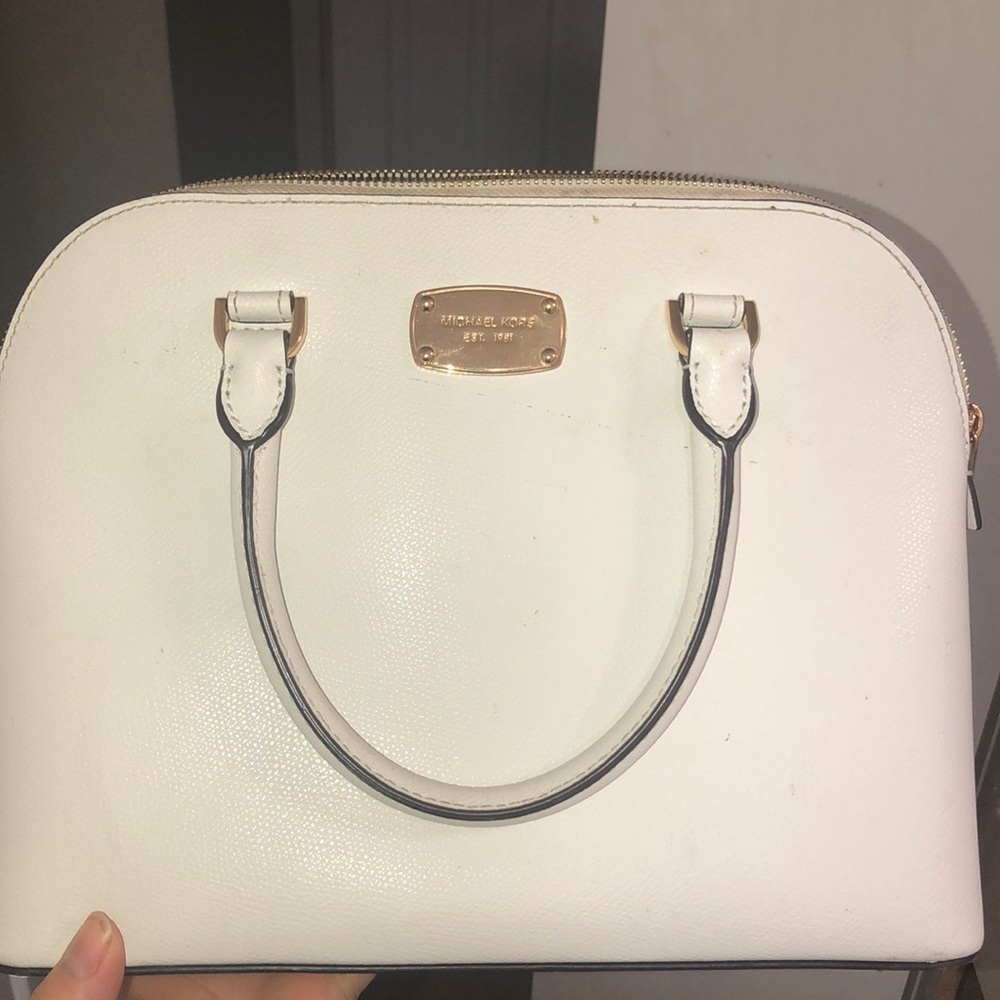Micheal kores white hand bag